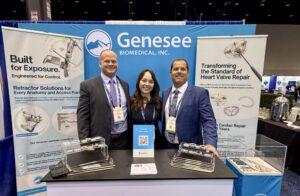 CEO, sales director and marketing director in front of Genesee booth